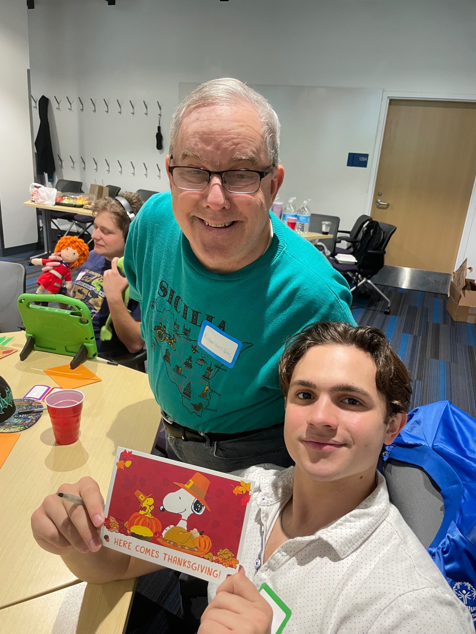 Mark and a friend making Thanksgiving cards
